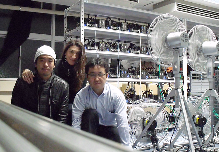 Rio Yokota, L Barba and Tsuyoshi Hamada, posing next to Degima, the do-it-yourself GPU cluster in Nagasaki, 2010